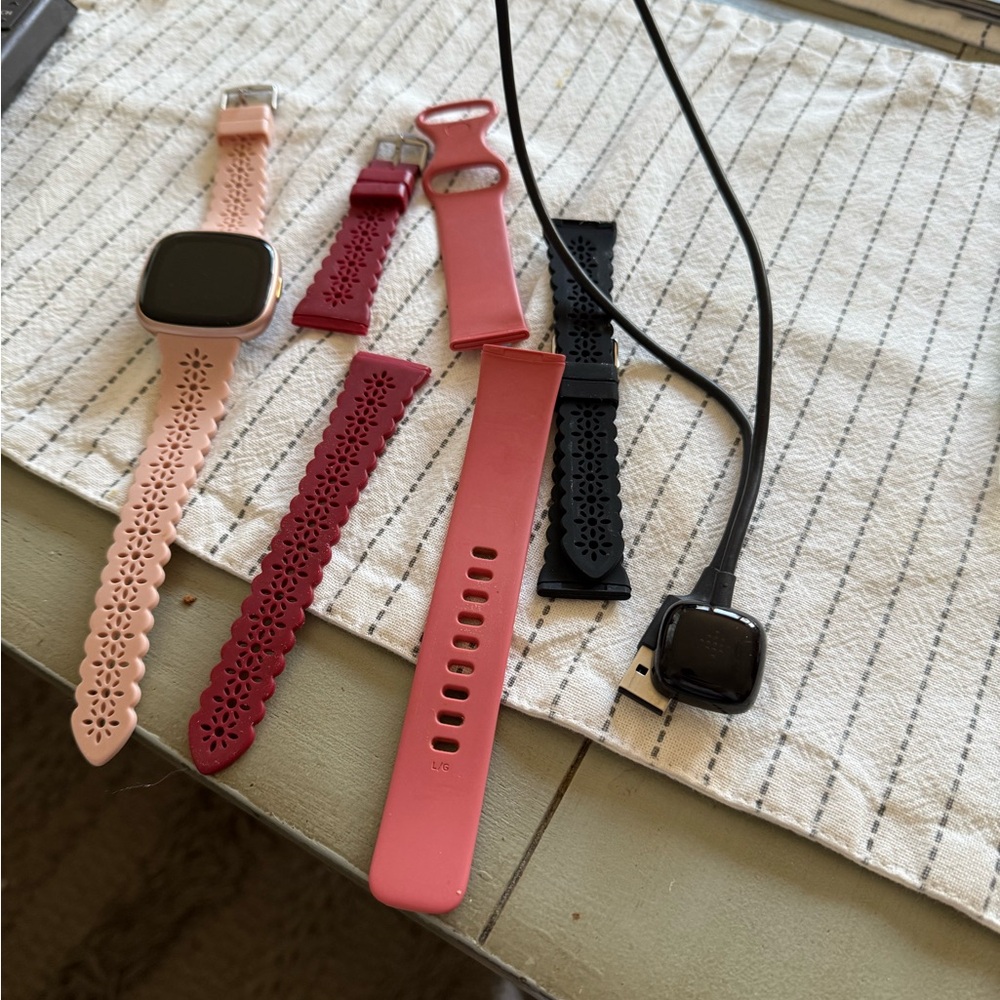 Smartwatch with Interchangeable Bands - Pink, Red, Black and charger